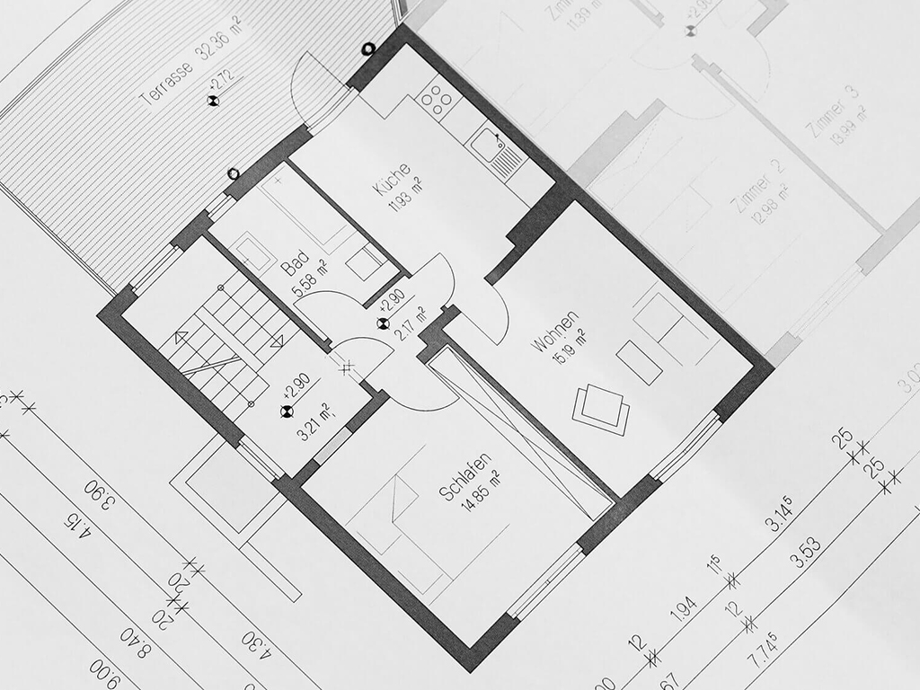 Detaillierter 2D-Grundriss einer Wohnung mit genauer Raumaufteilung für Wohnzimmer, Schlafzimmer, Küche, Bad und Terrasse.